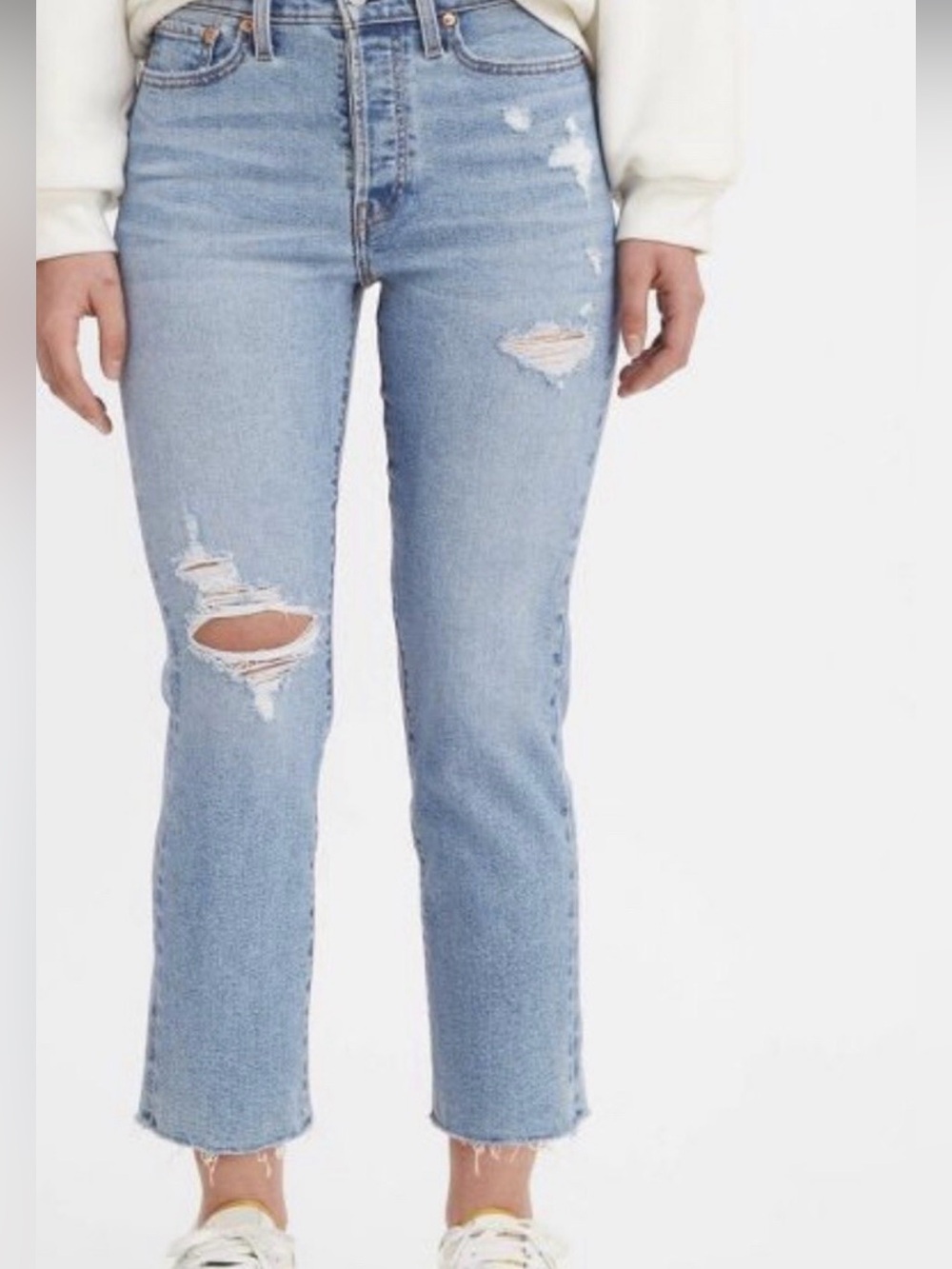 Levi's Light Blue Distressed Ankle Jeans with Knee Rip